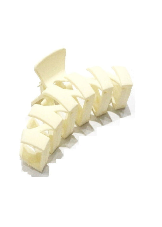 Ivory-colored shoe with a textured pattern on a white background