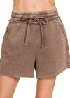 Brown shorts with a drawstring on a white background
