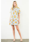 Woman wearing a floral dress with a white background