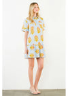 Woman wearing a floral dress with a white background