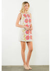 Woman wearing a floral dress on a white background