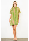 Woman wearing a green and white striped dress on a white background