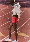 Person in athletic wear on a running track